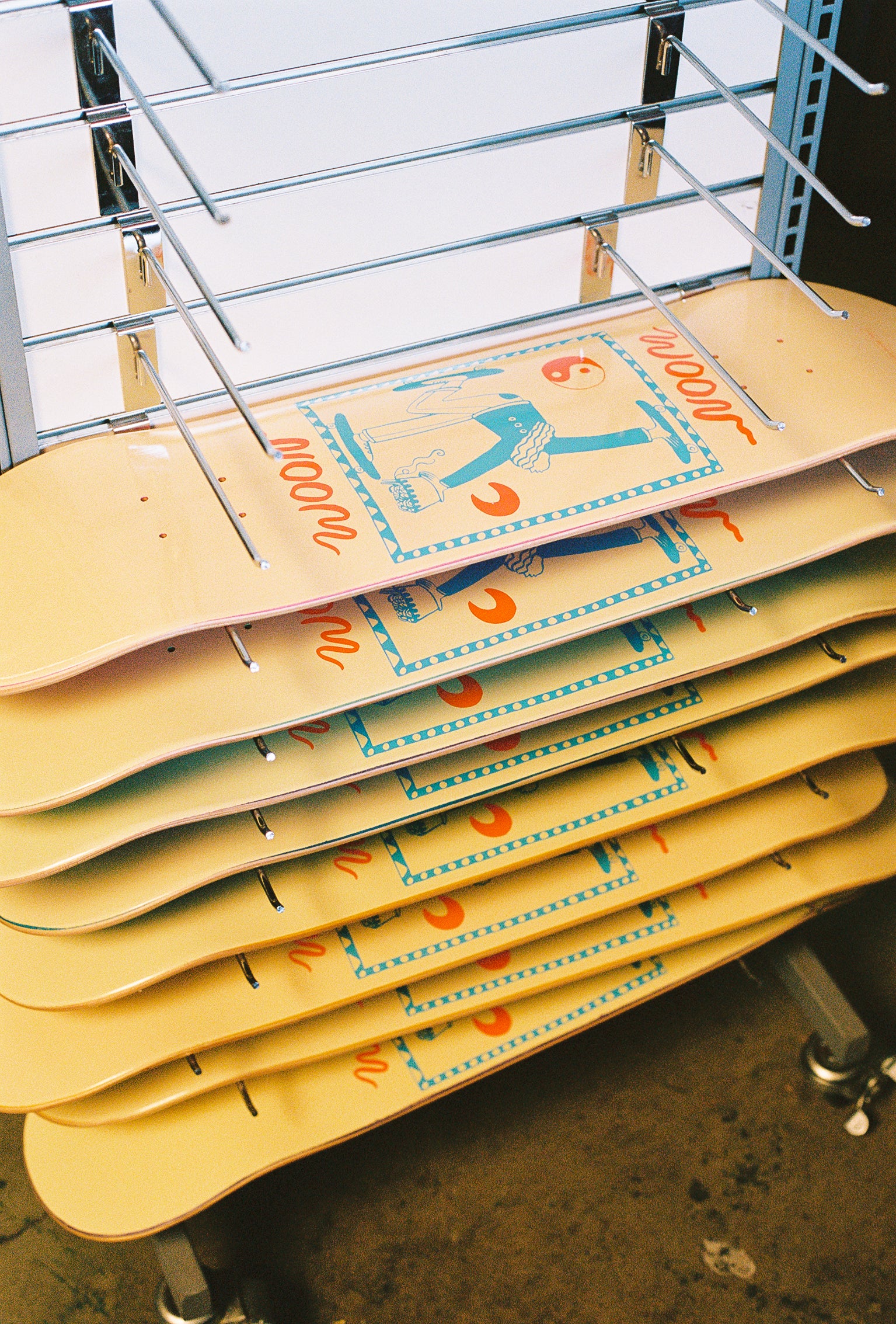 Stack of woon skateboards