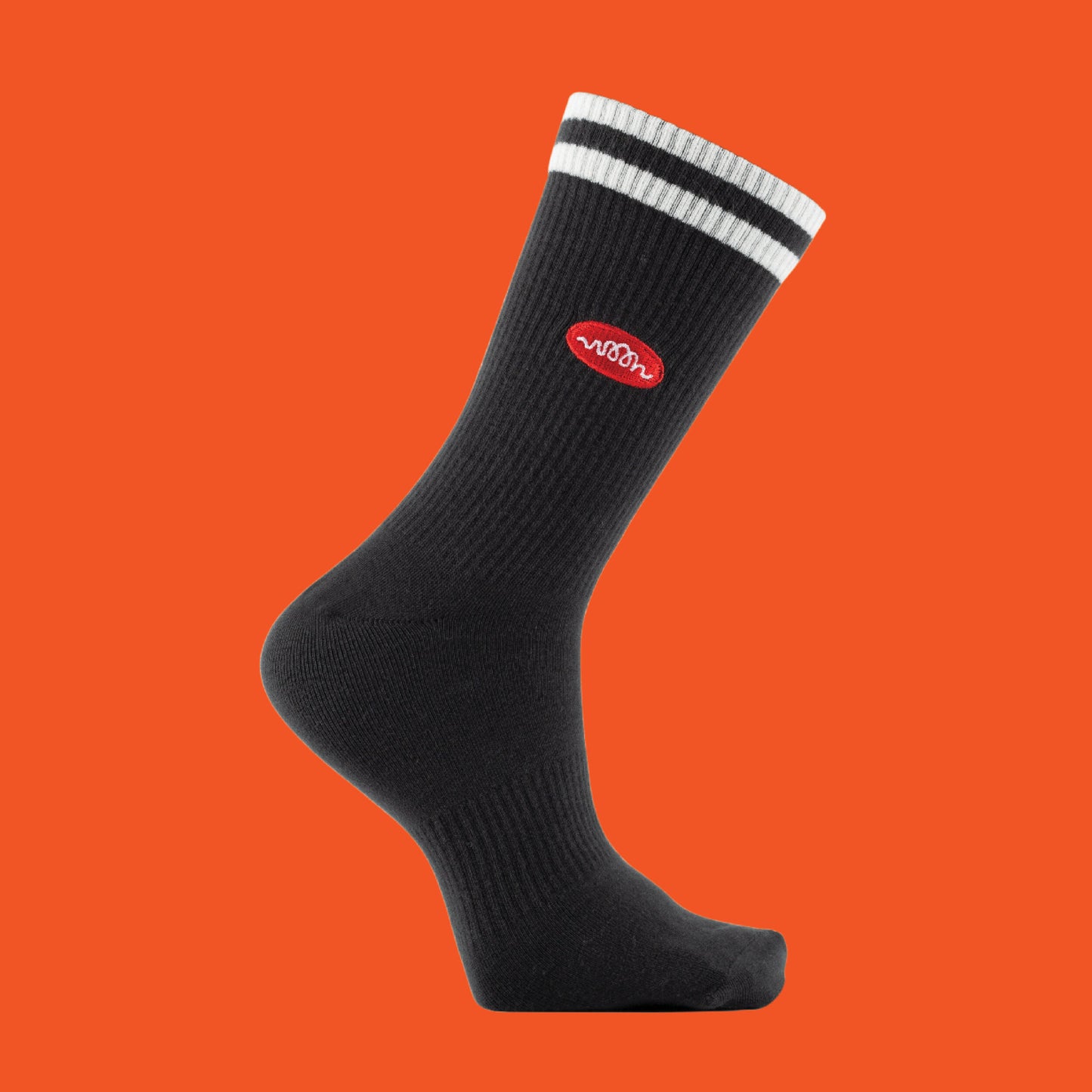A black sock with white stripes and woon logo