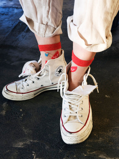 A person wearing mesh bowl socks