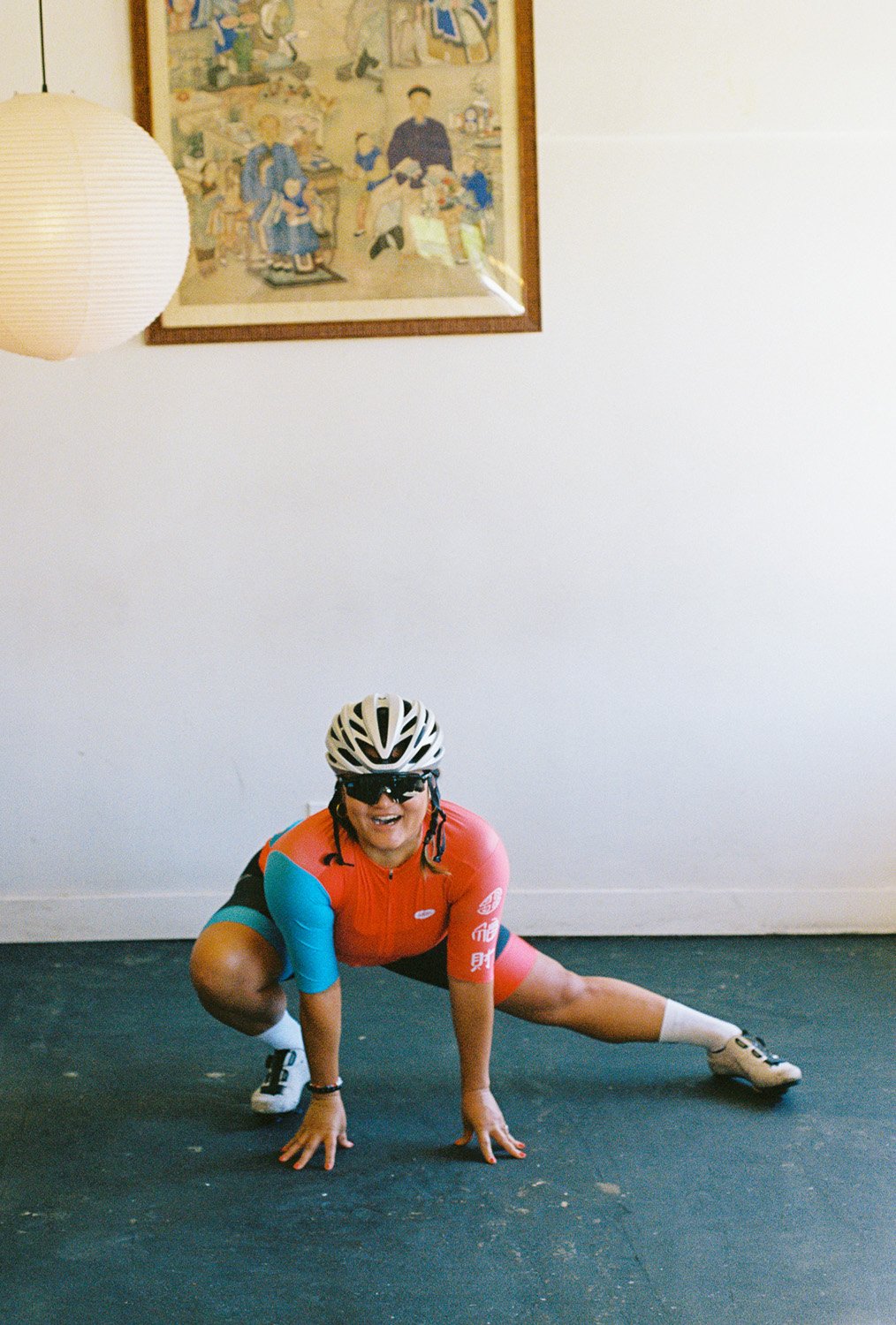 A woman wearing a woon cycling jersey