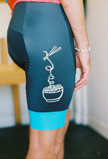 A close up of the side of cycling bib, picture of a bowl of noodles